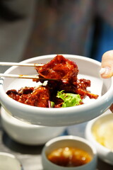 Korean BBQ with Raw Beef Short Ribs Grilled on Charcoal at Local Galbi Restaurant