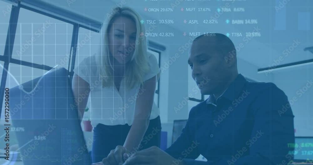 Poster colleagues leaning over laptop pointing at screen, analyzing with stock chart updating percents