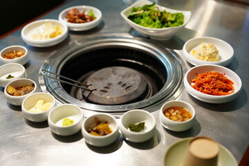 Korean BBQ with Raw Beef Short Ribs Grilled on Charcoal at Local Galbi Restaurant