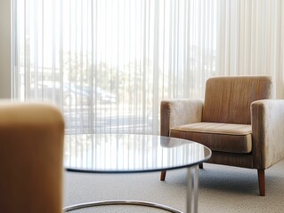 Sunlit modern waiting area with textured armchair and glass coffee table