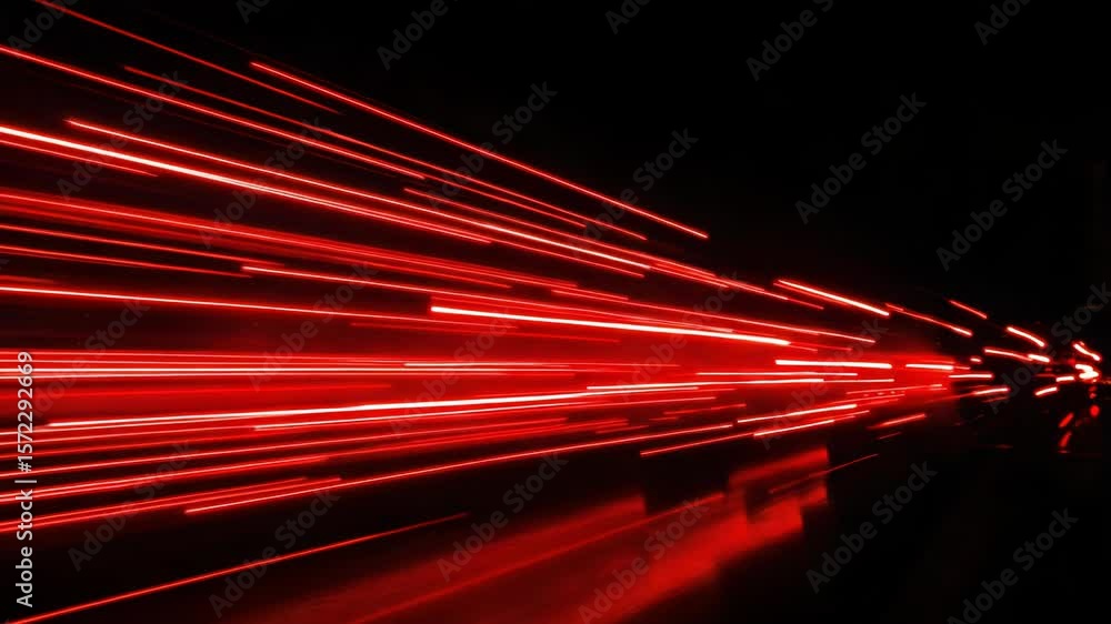 Aufkleber a vibrant display of red laser beams shooting across a dark background with sparks