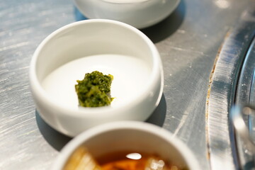 Korean BBQ with Raw Beef Short Ribs Grilled on Charcoal at Local Galbi Restaurant