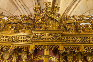 A stunning golden architectural detail showcasing intricate carvings