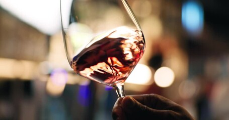 Hands, person and swirl wine in glass for taste testing, quality control and sensory ritual. Customer, inspection and red alcohol for aroma, balance flavour and evaluation process to prepare palate - Powered by Adobe