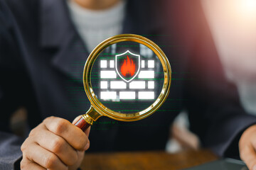 Digital representation of a firewall with a shield and magnifying glass, symbolizing cybersecurity...