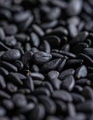 Photograph of black cumin seeds, focusing on their unique shapes and textures