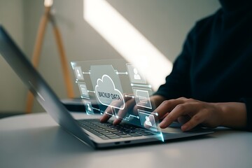 Person using laptop with holographic cloud data backup interface hands typing