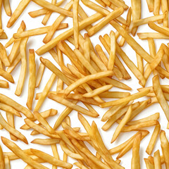 Crispy golden french fries close up for fast food concept, comfort food, junk food craving, isolated on white background