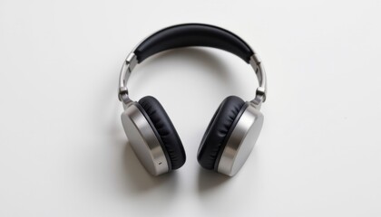a minimal clean brushed metal headphones in the shape of a cone with glassy reflection, no text or branding, isolated on pure white background, ultra high resolution.