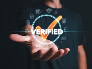 Verified confirmation digital checkmark glowing orange and white text with surrounding icons verification