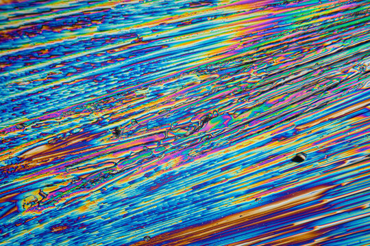 Colorful microcrystals of urea displaying vibrant patterns