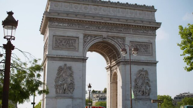 Arc de Triomphe Paris cityscape. Beautiful architecture of historical monument in downtown of the capital of France. Walking in European tourist city.