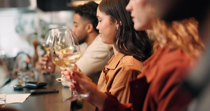 Group, people and swirl wine for tasting experience, release aroma or improve flavor at pub. Friends, glass and test alcohol for quality drink, beverage or woman at bar for happy hour at social event