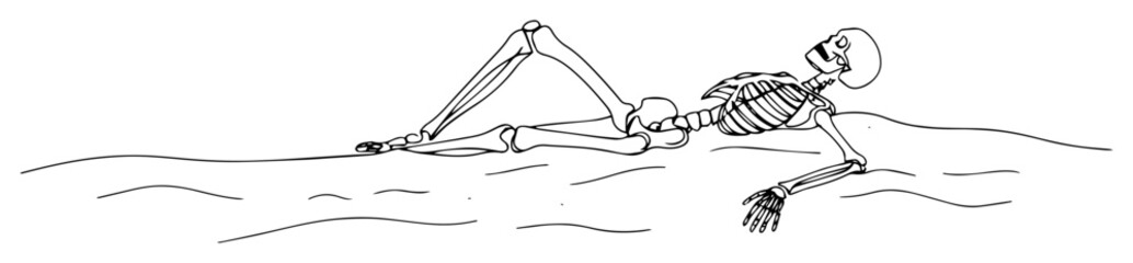 skeleton lying on beach