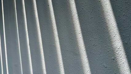 The Shadow And Light On The Concrete Wall Rough Surface Texture Under Canopy Roof On A Sunny Day