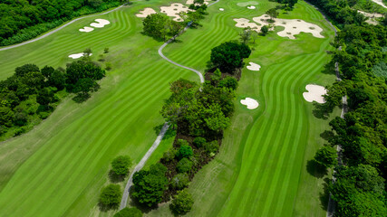 Aerial top view golf course with lush greens, green fairway and sand bunker, Golf course green...