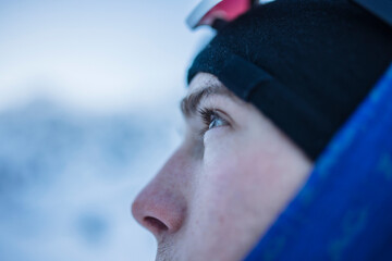 Close-up of skier’s eye in Kitzbühel snowy mountains