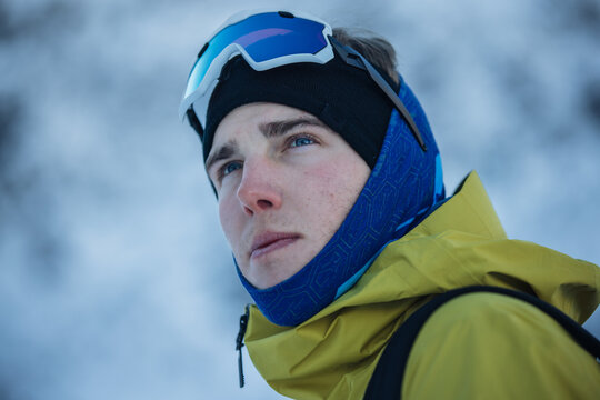 Focused skier in Kitzb&uuml;hel Alps wearing blue headwear
