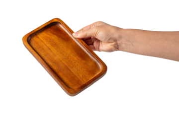 Wooden plate in hand on transparent background.