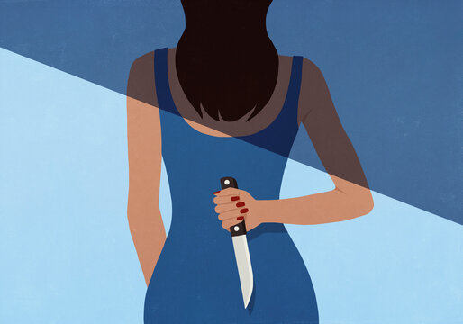 Shadow over rear view of woman in blue dress holding knife
