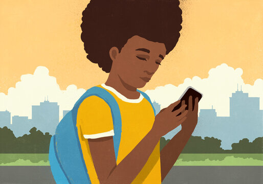 Schoolgirl with backpack using smart phone in city park
