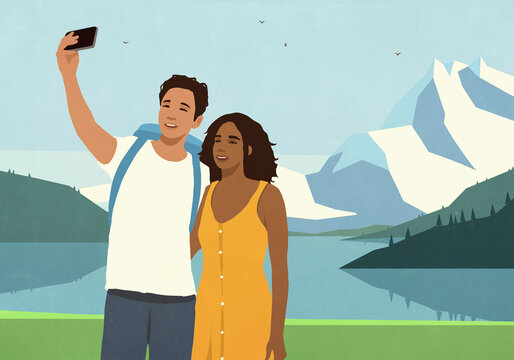 Happy couple enjoying summer getaway, taking selfie at sunny mountain lakeside
