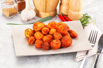 Baked young potato with paprika