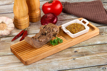 Steamed pork tongue with mustard