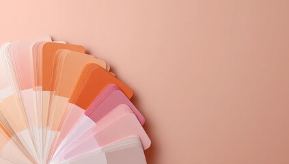 Fan of color swatches, various shades of peach, blush, and beige