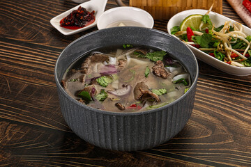 Vietnamese Pho Bo soup with beef and noodles