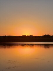 sunset on the lake in summer