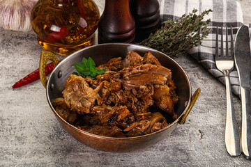 Shredded slow cooked pork meat
