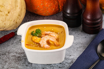 Pumpkin cream soup with prawns