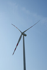 Modern wind turbine under a clear blue sky. Austria.