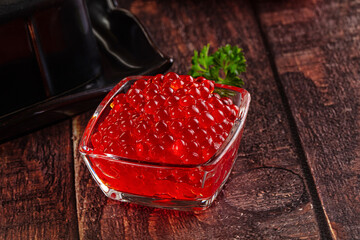 Salmon red caviar in the bowl
