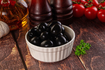 Mediterranean marinated Black olives in the bowl