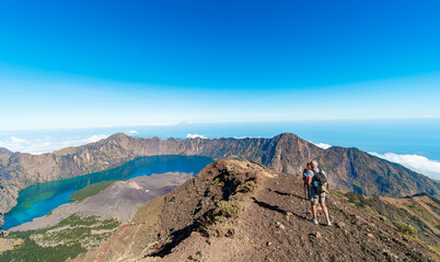 Hiker and traveller hiking at Mount Rinjani, Lombok, the second highest volcano in Indonesia.