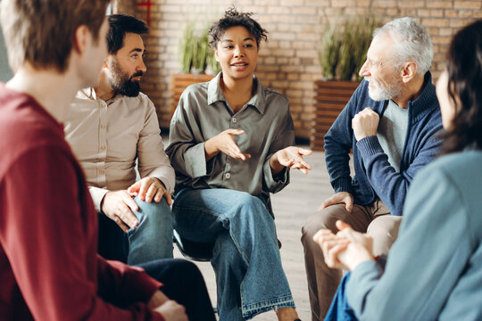 Patients listening to doctor during group therapy session