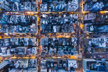 Aerial top down view of residential area with street grid plan at night, Hong Kong