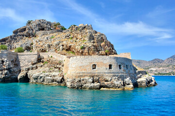 View on wall ruins of Spinalonga Fortress, former leper colony, Crete, Greece