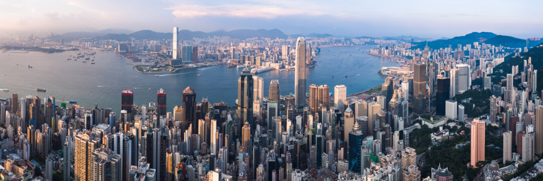 Panoramic of harbour and skyline at sunset, Hong Kong