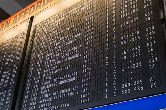 Main hall European airport main hall with black vintage mechanical flight information display board, flight arrivals and departures board European Airport, Germany, Frankfurt - February 6, 2025