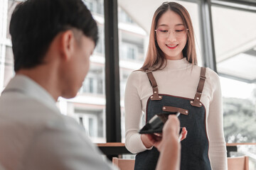 Payment exchange between young adults at a trendy , social interaction scene, modern vibe
