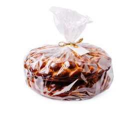 Freshly baked bread wrapped in clear plastic ready for sale