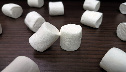 White marshmallows on a wooden table