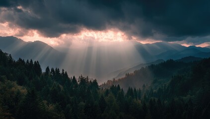 Fototapeta premium Mountain vista, sunbeams piercing dark clouds