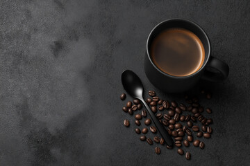 Black coffee beans, spoon, and mug on a dark surface. Perfect for coffee blogs, marketing materials, social media posts, and cafe menus.