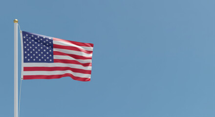 Fototapeta premium American flag waving against blue sky