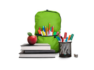 A back to school scene of a pile of three study books to learn from, a red apple, green school bag...