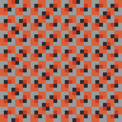 Pattern created from small red squares in orange squares and small charcoal black squares in grey squares